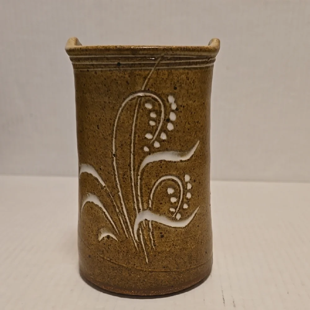 Brown Signed Pottery Vase with White Floral Design
